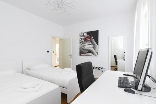 A bed or beds in a room at Bella Vita Charming House