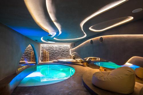 a hot tub in a room with a view at Mediterranean Palace in Thessaloniki