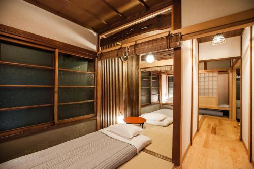Lova arba lovos apgyvendinimo įstaigoje Araiya Tokyo -Private Townhouse-