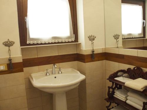 Koupelna v ubytování Corte dei Melograni