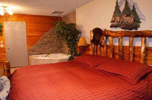 Ένα ή περισσότερα κρεβάτια σε δωμάτιο στο Crandell Mountain Lodge