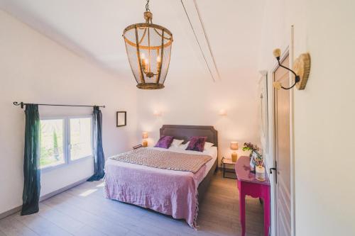 Ένα ή περισσότερα κρεβάτια σε δωμάτιο στο Maison Sadina