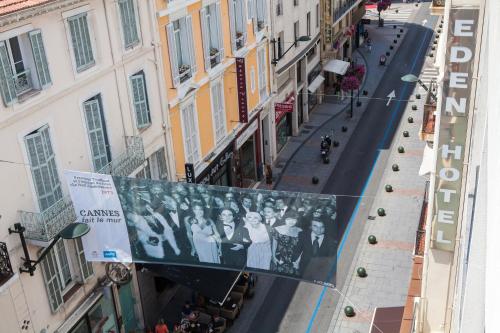 an overhead view of a city street with a billboard at Eden Hotel & Spa in Cannes