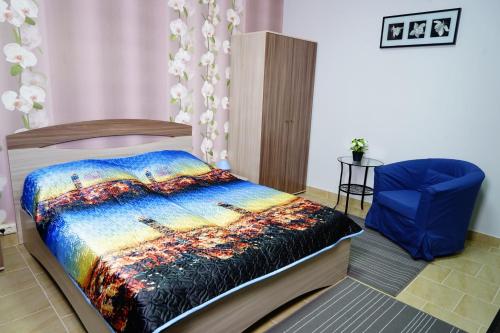 
Кровать или кровати в номере Apartamenty Na Sovetskoy
