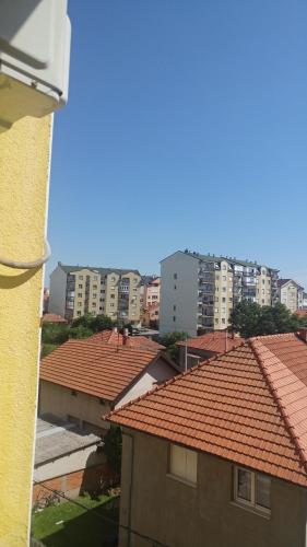 a view of roofs of buildings in a city at Lovely L home BN centar -Rent a car automatic in Bijeljina