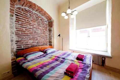 Postel nebo postele na pokoji v ubytování AirHome - Cozy Apartment