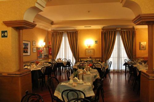 Ресторант или друго място за хранене в Hotel Pomezia