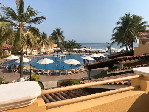 Πισίνα στο ή κοντά στο Villa 18 Con Playa 3 Recamaras dentro de Hotel en Ixtapa