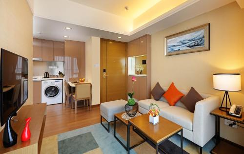 Kuchyň nebo kuchyňský kout v ubytování Yuwa Serviced Residence
