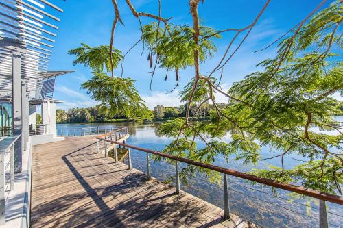 a view of the river from the deck of a house at Best Western Plus North Lakes Hotel in North Lakes