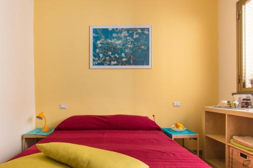 Ένα ή περισσότερα κρεβάτια σε δωμάτιο στο Casa Arsella