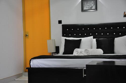 Postel nebo postele na pokoji v ubytování Villa Hotel