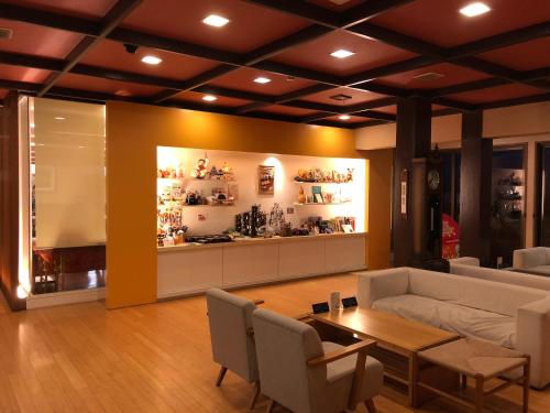 a living room with a couch and a table at Satsuki Bessou in Tamana
