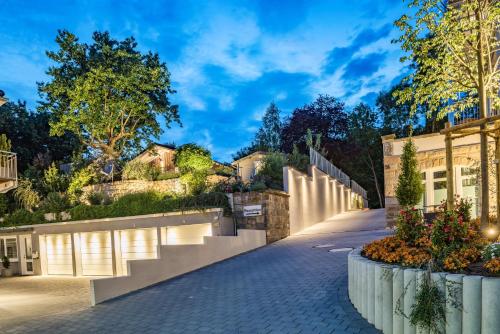 a driveway of a house at dusk at City-Appartements Am Wall in Goslar
