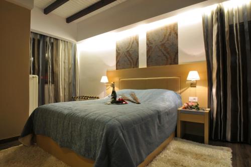 Ένα ή περισσότερα κρεβάτια σε δωμάτιο στο Ξενώνας Χρύσα