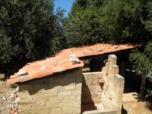 a roof of a building with birds on it at the ancient sicilian house near zingaro reserve Scopello in Scopello
