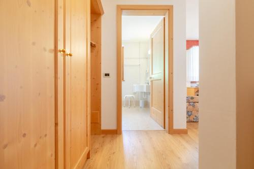Postel nebo postele na pokoji v ubytování Hotel Garni la Stua