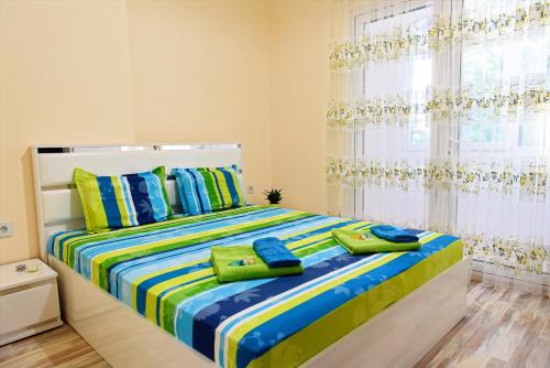 Katil atau katil-katil dalam bilik di Apartment Iris