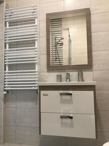A bathroom at Villa Relax Apartman
