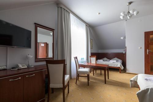 Postel nebo postele na pokoji v ubytování Hotel Skalite Spa & Wellness