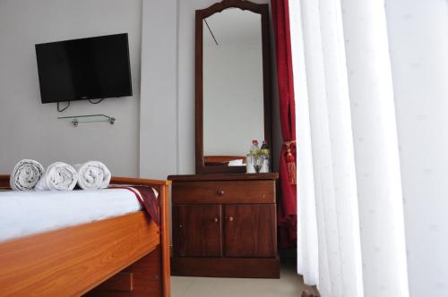 Postel nebo postele na pokoji v ubytování Villa Hotel