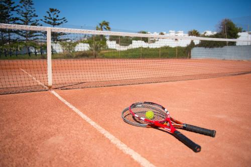 a tennis racket on a tennis court at Iberostar Founty Beach in Agadir