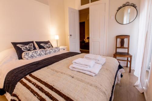 A bed or beds in a room at Casa do Tanque T2