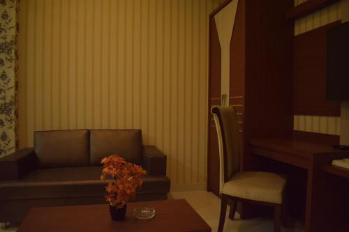 Zona de estar de Hotel Uday Palace