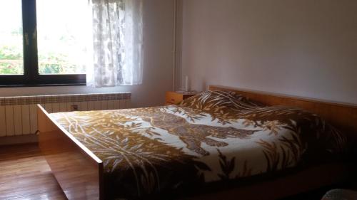 Postel nebo postele na pokoji v ubytování Apartman Milada Vrvilo