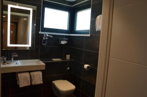 Un baño de Hôtel ORIGAMI