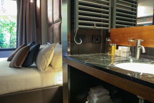 Kuchyň nebo kuchyňský kout v ubytování Triviho Hotel