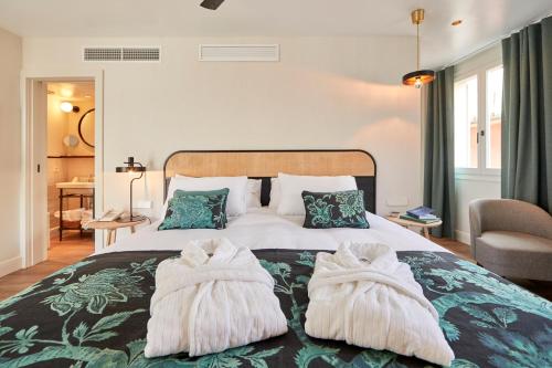 En eller flere senge i et værelse på MHOUSE Boutique Hotel Palma