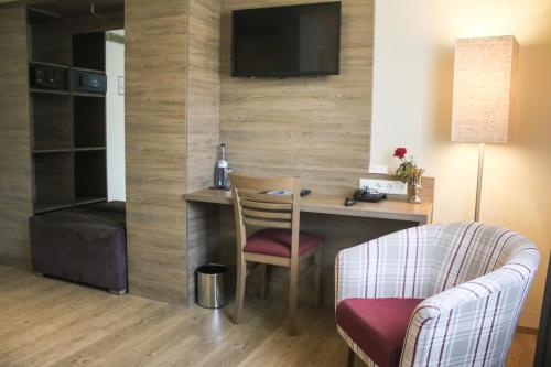 TV a/nebo společenská místnost v ubytování Boutique Hotel zur Post
