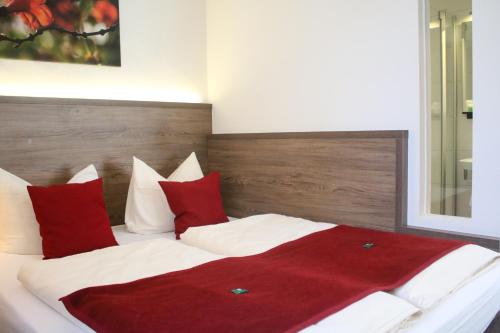 Postel nebo postele na pokoji v ubytování Boutique Hotel zur Post