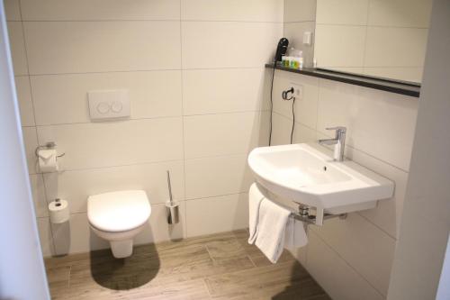 Koupelna v ubytování Boutique Hotel zur Post