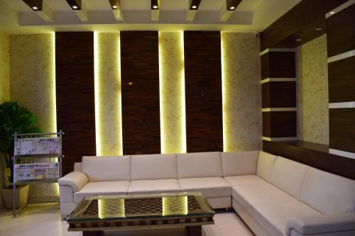 Zona de estar de Hotel Uday Palace