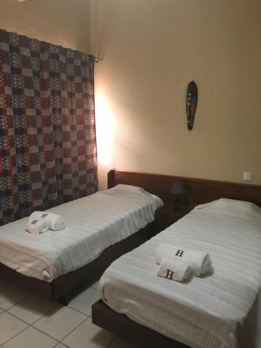Ένα ή περισσότερα κρεβάτια σε δωμάτιο στο Hotel Central