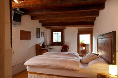 Katil atau katil-katil dalam bilik di Dormì & Disnà