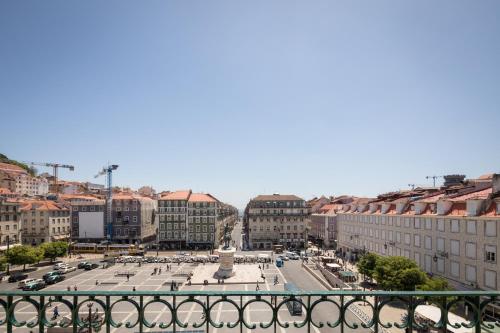 a view of a city from a bridge at The Visionaire Apartments in Lisbon