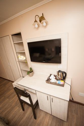 TV a/nebo společenská místnost v ubytování Hotel Posadas