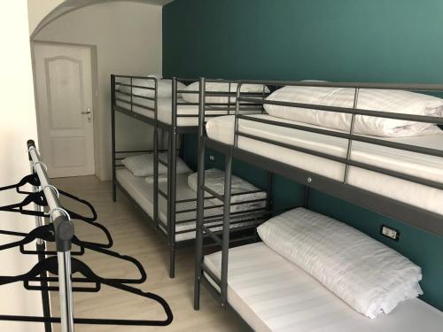 a room with four bunk beds in a room at Hostel Sleeping Beauty in Ljubljana