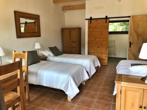 Posteľ alebo postele v izbe v ubytovaní Hotel Mas Pelegri