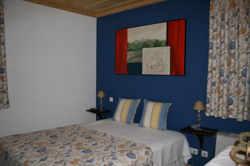 Llit o llits en una habitació de Quinta da Fonte Arcada