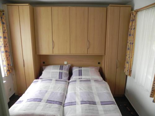 Кровать или кровати в номере Waldblick