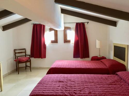 Кровать или кровати в номере La Cipriana