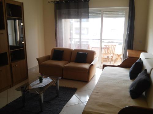 Posezení v ubytování Apartamento T1 Canto dos Poetas