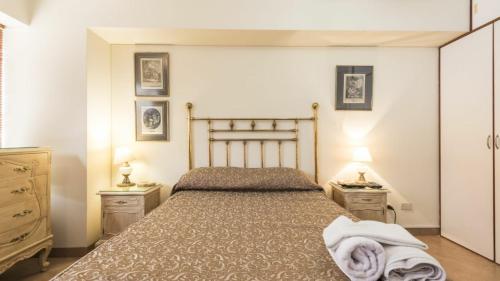 מיטה או מיטות בחדר ב-Apartamento Edificio Pardo Cinco