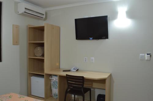 Televisyen dan/atau pusat hiburan di Hotel Ijuí