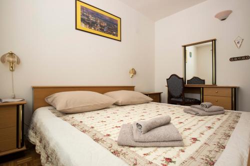 Postel nebo postele na pokoji v ubytování Vrata Jadrana 1