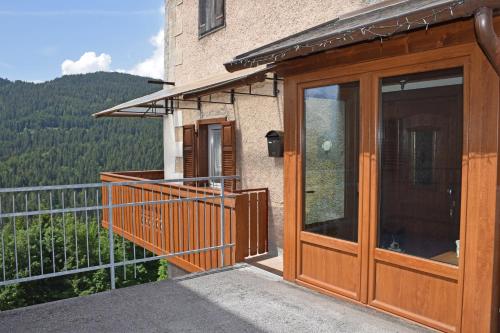 a balcony with a view of a mountain at La Suite in Candide